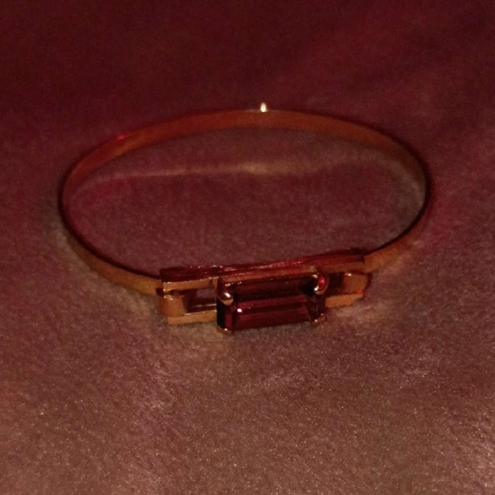 Elegant Gold Bracelet with Red Gemstone